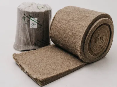 Rolls and branded packaging of hemp insulation by Konsulate™